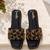 Black crystal embellished faux leather flats for women