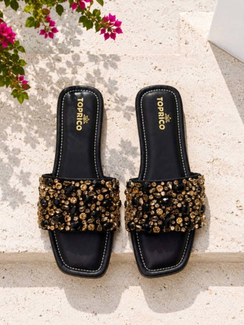 Black crystal embellished faux leather flats for women