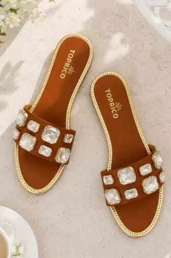 Tan crystal embellished faux leather slip-on flats for women