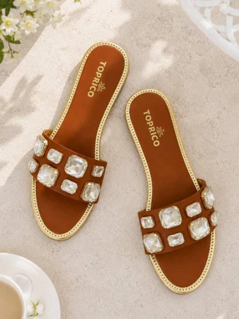Tan crystal embellished faux leather slip-on flats for women