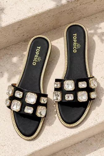 Black crystal embellished faux leather slip-on flats for women