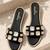 Black crystal embellished faux leather slip-on flats for women