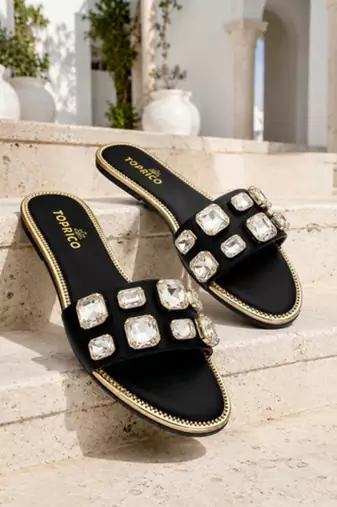 Black crystal embellished faux leather slip-on flats for women