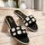 Black crystal embellished faux leather slip-on flats for women