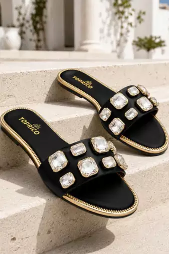Black crystal embellished faux leather slip-on flats for women