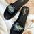 Black beaded faux leather evil eye flats for women