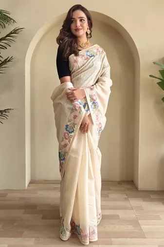 Beige embroidery work puretussar saree with  blouse piece