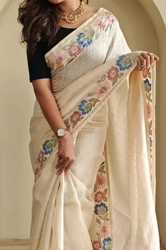 Beige embroidery work puretussar saree with  blouse piece