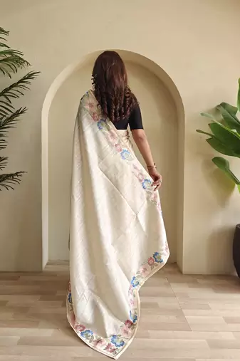 Beige embroidery work puretussar saree with  blouse piece