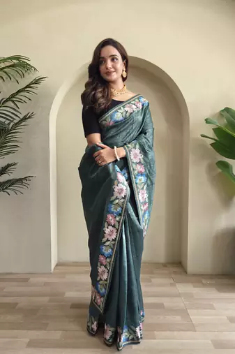 Green embroidery work puretussar saree with  blouse piece