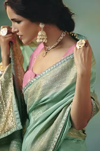 Light sea green zari woven silk blend viscose dola silk saree with blouse