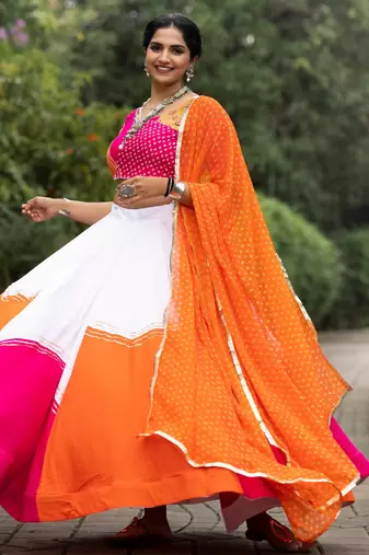 navratri collection white & orange flared lehenga set  pink bandhani blouse & dupatta - full stitched free size
