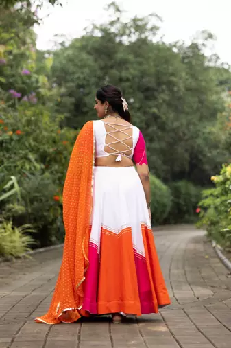 navratri collection white & orange flared lehenga set  pink bandhani blouse & dupatta - full stitched free size