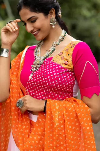 navratri collection white & orange flared lehenga set  pink bandhani blouse & dupatta - full stitched free size