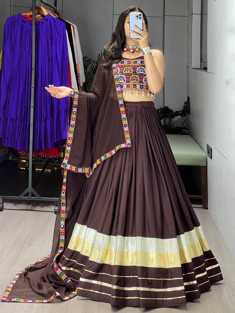 deep brown flared navratri lehenga choli with metallic zari borders & shell tassels - full stitched free size