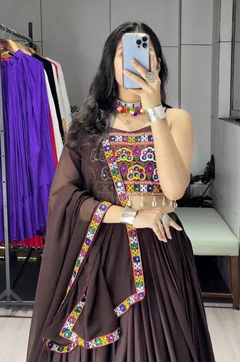 deep brown flared navratri lehenga choli with metallic zari borders & shell tassels - full stitched free size
