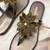 Gold beaded faux leather flower t-strap flats for women