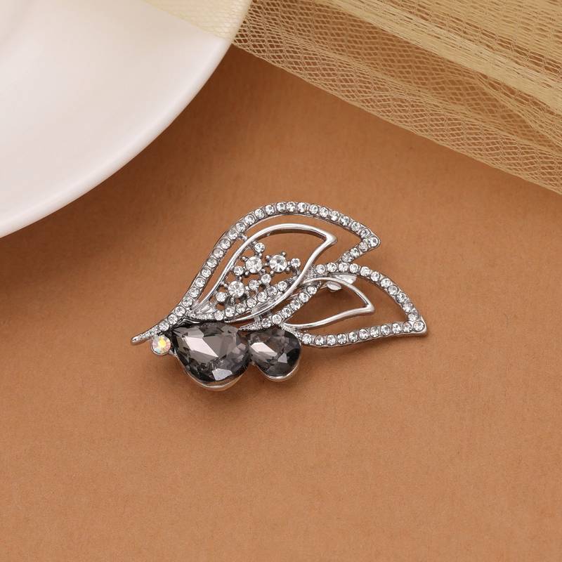 Black color leaf design brooch nature inspired design