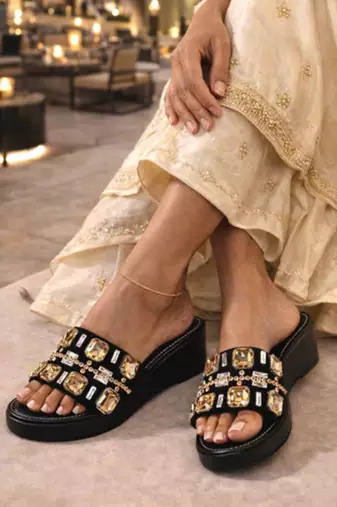 Black crystal embellished faux leather wedge heels for women