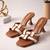 Tan woven artificial leather flared block heel sandals for women