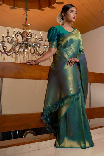 green woven pure silk blend designer pallu saree with blouse