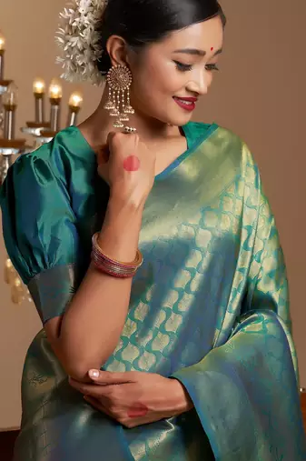 green woven pure silk blend designer pallu saree with blouse