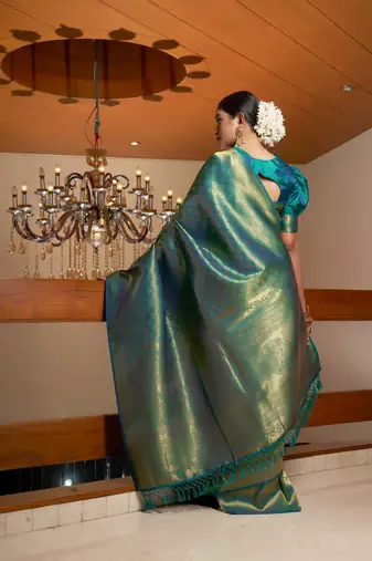 green woven pure silk blend designer pallu saree with blouse