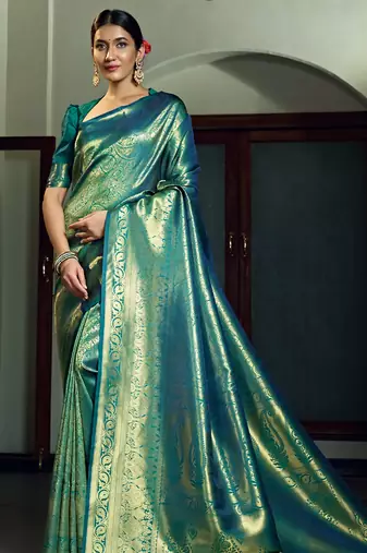 teal blue woven pure silk blend designer pallu saree with blouse