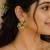 Traditional south indian gold plated green kemp stone & pearl drop chandbali temple peacock earrings for women
