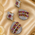 Gold Finish American Diamond Purple Stone Drop Earrings