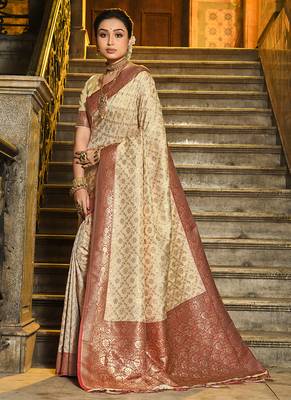 Cream banarasi silk blend saree with red zari border 1