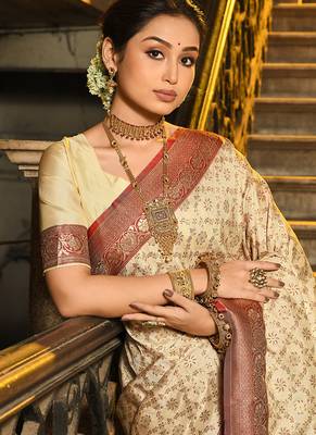 Cream banarasi silk blend saree with red zari border 2