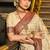 Cream banarasi silk blend saree with red zari border