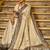 Cream banarasi silk blend saree with navy blue zari border