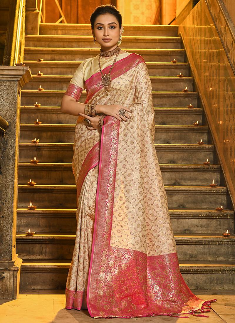 Cream banarasi silk blend saree with rani pink zari border