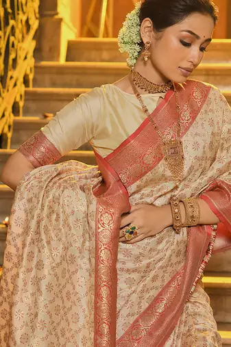 Cream banarasi silk blend saree with red zari border
