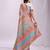 White linen cotton blend saree with multicolor ethnic print