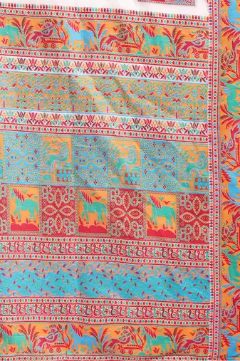 White linen cotton blend saree with multicolor ethnic print