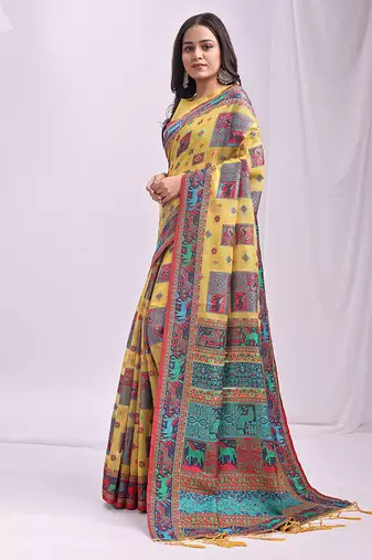 Yellow linen cotton blend saree with multicolor ethnic print
