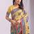 Yellow linen cotton blend saree with multicolor ethnic print