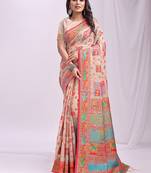 Beige linen cotton blend saree with multicolor ethnic print