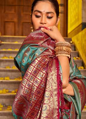 Teal blue banarasi silk blend saree with magenta zari border 2