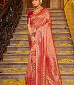 Peach banarasi silk blend saree with rani pink zari border