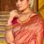 Peach banarasi silk blend saree with rani pink zari border