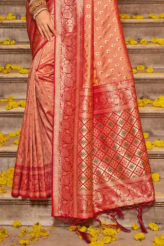 Peach banarasi silk blend saree with rani pink zari border