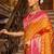 Orange banarasi silk blend saree with magenta zari border
