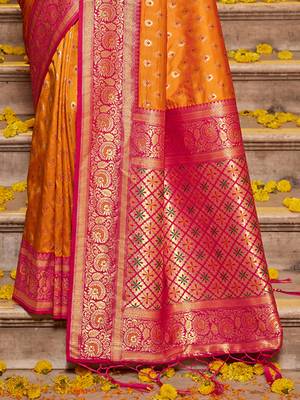 Orange banarasi silk blend saree with magenta zari border 3