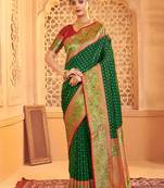 Dark green banarasi silk blend gold zari weaving saree with contrast border