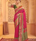 Rani pink banarasi silk blend gold zari weaving saree with contrast border