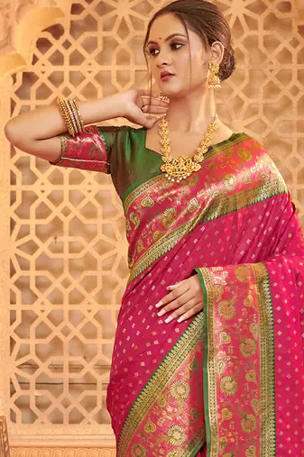 Rani pink banarasi silk blend gold zari weaving saree with contrast border